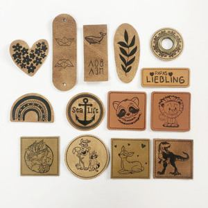 Индивидуальные нашивки из искусственной кожи с тисненым или рельефным логотипом, пришивные или термоклеевые, с люверсами для одежды - Product Image 1