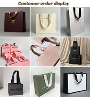Sacs en papier de luxe portables promotionnels en gros SHINY avec logo pour le shopping, les cosmétiques, les cadeaux, avec ruban