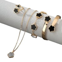 Parure de bijoux en alliage de zinc or et argent quatre pièces avec collier, boucles d'oreilles et bracelet pour femme