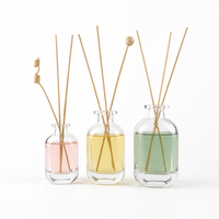 Vente en gros de flacons diffuseurs en verre à fond épais de 50 ml, 100 ml, 150 ml, flacon d'arôme plat transparent, impression personnalisée pour l'huile de diffuseur