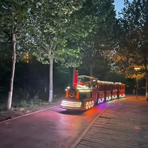 Paseos de atracciones Tren eléctrico sin rieles Tren turístico grande Combustible o batería a la venta