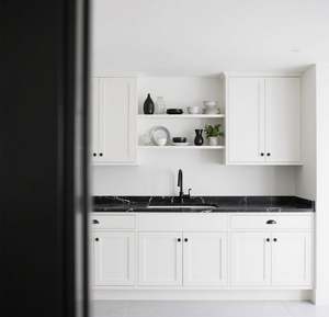 SANTOPOVA Modern White Shaker-Style Kitchen with Black Marble Countertop and Stainless Steel Appliances - Product Image 4