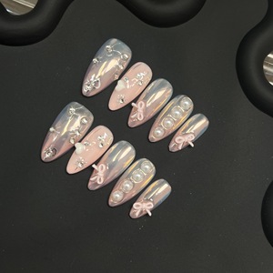 <span class=keywords><strong>Uñas</strong></span> postizas hechas a mano con efecto espejo cromado, lazos blancos 3D, dijes de perlas elegantes, <span class=keywords><strong>uñas</strong></span> futuristas de <span class=keywords><strong>alto</strong></span> brillo, venta al por mayor - Product Image 4