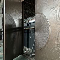 Porte de villa double entrée en aluminium sculpté de luxe, embossée, gris foncé mat, antivol, sécurisée, sur mesure.