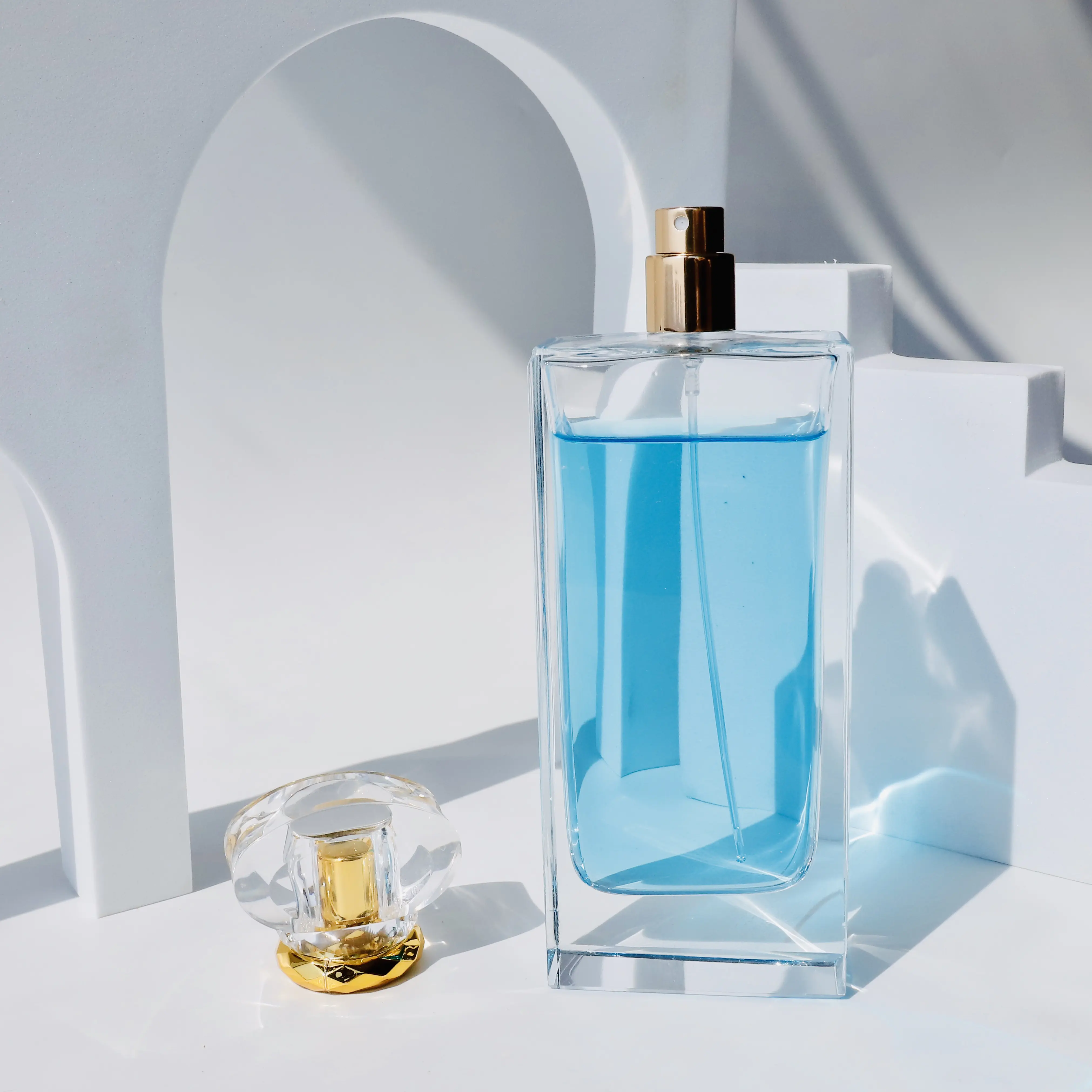 キャップ付き化粧品高級スクエア透明空50ML100MLガラス圧着香水瓶を製造