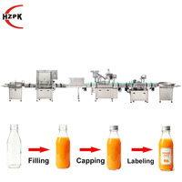 Ligne de production HZPK automatique de lavage, remplissage, bouchage et étiquetage pour bouteilles rondes en verre et en plastique (liquides, pâtes, sauces, eau)