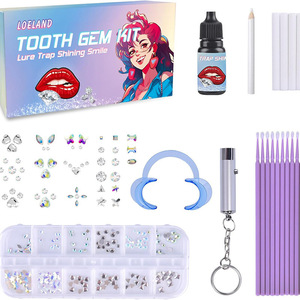 Kit de gemme de <span class=keywords><strong>dent</strong></span> de décoration de gemme de dents dentaires de Offre Spéciale avec la lumière de polymérisation et les gemmes solides de <span class=keywords><strong>dent</strong></span> de pierre de cristal de colle - Product Image 1