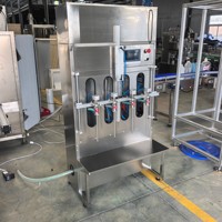 Machine de remplissage à gravité à deux étages anti-éclaboussures pour liquides à forte formation de mousse