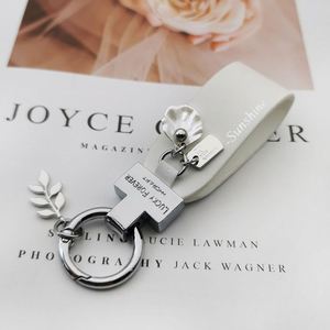 Hot Selling Exquisite and Cute French Alloy <b>Leather</b> <b>Keychain</b> with High Quality Rope Buckle for Car Pendant Women's Gift - Product Image 4