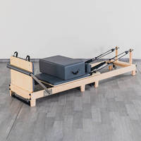 Suministro al por mayor de reformadores de Pilates de roble plegables, equipos de fitness para gimnasio, fábrica OEM personalizada