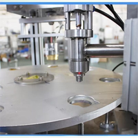 Machine automatique de remplissage et de scellage de gobelets motorisée haute précision pour boissons et sauces, avec scellage quantitatif facile pour gobelets en plastique
