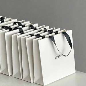 Custom Luxury Gold Foil Matte Embossed Laminated <strong>Paper</strong> <strong>Bag</strong> <strong>Logo</strong> Large Medium White Gift Sturdy <strong>Paper</strong> Clothing Store Shopping <strong>Bag</strong> - Product Image 1