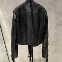 Veste en cuir courte rétro style western pour femme, en cuir de mouton véritable, noire avec franges et pompons