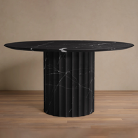 Table à manger ronde en marbre Dream Home, base cylindrique cannelée en pierre, pierre veinée naturelle, pour un espace repas luxueux