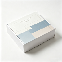 Boîte d'expédition en carton ondulé personnalisée avec motif géométrique coloré pour vêtements, accessoires et emballages e-commerce