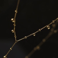 Collar de cadena tipo lariat en forma de Y de moda, chapado en oro de 18 quilates, de acero inoxidable, con colgante de bola delicado y borla larga, para mujer, ideal para fiestas y vestidos.
