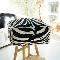 Pouf moderne à faux pouf imprimé zèbre, tabouret à un siège écologique et durable pour se reposer, lire et jouer