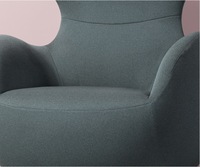 Fauteuil lounge moderne à dossier haut avec base pivotante pour hall d'hôtel et réception