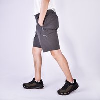 Shorts de randonnée pour hommes imperméables et coupe-vent en nylon et élasthanne tissé respirant de haute qualité, extensibles dans les quatre sens avec fermeture éclair