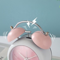Vente en gros d'horloges de bureau silencieuses circulaires personnalisables de 4 pouces, fonction snooze, mouvement à quartz, fonctionnant sur piles