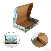 Boîte d'expédition en carton ondulé personnalisée à faible MOQ avec gaufrage et pelliculage mat, doublure en mousse pour commandes mobiles