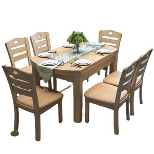 ชุดโต๊ะอาหารไม้จริงสไตล์โมเดิร์นพร้อมเก้าอี้ - Product Image 1