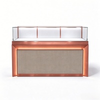 Comptoir de présentation de bijoux en verre LED or rose de luxe avec panneau en tissu pour magasin de vente de bijoux