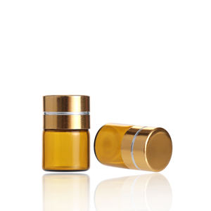 Pequeño frasco redondo de vidrio ámbar para aceites esenciales, cosméticos, vacío, de 1 ml, con tapa de rosca de aluminio dorado y plástico. - Product Image 4