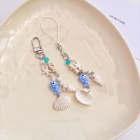 Colgante de concha de cerámica con forma de pez, cadena para teléfono móvil, llavero, estilo Ins, colgante para bolso con concha marina y estrella de mar, colgante para bolso hecho a mano con temática oceánica y cuentas