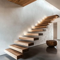 Escalier flottant intérieur moderne à bande ouverte, design durable en acier inoxydable avec hauteur de contremarche personnalisable pour appartements