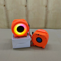 Nouvelle Enceinte Portable Extérieure Mini Sans Fil Étanche en Plastique avec Subwoofer DC, Lumière LED RGB 7 Couleurs et Horloge, Mode Privé Transfrontalier