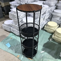 Table d'appoint ronde pliable moderne avec roulettes et panier en filet pour salon, petit espace et mobilier d'appartement