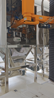 Robot d'expédition de sacs de granulés anti-explosion |   Système robotique antistatique de déballage pour sacs de 25 à 200 kg |   Entièrement personnalisable
