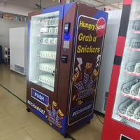 Distributeur automatique de collations et de boissons en libre-service 24 heures sur 24 avec pépites de chocolat maintenant disponible à la vente OEM ODM