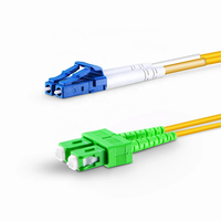 Kabel Patch Fiber Optik Single Mode OS2 2 Serat LC UPC ke SC APC Duplex Tight-Buffered OFNR Jumper Cable 2.0MM