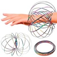 Bracelet lumineux anti-stress en acier à ressort pour adultes, jouet sensoriel magique qui tourne dans le noir