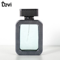 Flacon de parfum vide en verre transparent carré portable rechargeable OEM de 100 ml avec pulvérisateur à pompe et impression sérigraphique