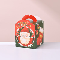 Boîtes de papier d'emballage de cadeau de joyeux Noël de 4 conceptions personnalisées par usine avec la poignée petite boîte de friandises de biscuit de sucrerie pour la partie