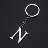 Porte-clés alphabet A-Z pour femme, breloque de sac à main en métal imprimé UV, léger, pendentif lettre initiale unique avec anneau porte-clés