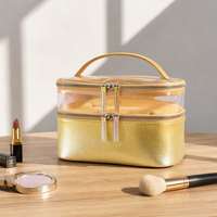 Sac cosmétique carré en PVC transparent avec garniture en cuir PU doré, fermeture éclair et poignée, organiseur de maquillage de voyage