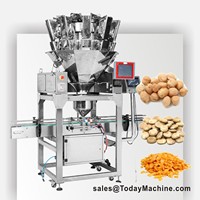 Machine de remplissage et de pesage pour pots et bouteilles de 200g de granulés de chocolat et de noix pour éclairs