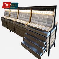 Meuble de rangement personnalisable OUYEE OY-054 vert peint, unique et attrayant, pour présentation de lunettes en opticien, avec tige de présentation et verre trempé
