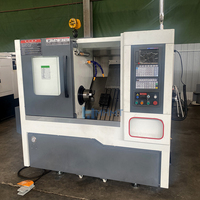 Tour CNC à lit incliné de petite taille, haute précision et haute vitesse, avec guidage linéaire, modèle TCK40