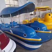 Nouveau design de bateau électrique dauphin en fibre de verre auto-drainant pour 4 personnes pour l'amusement familial et les jeux d'eau Matériau en acier durable