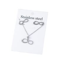 Vente en gros de colliers à breloques classiques en acier inoxydable, ensemble de colliers à breloques géométriques simples, design d'amour lisse, deux pièces, cadeau d'anniversaire