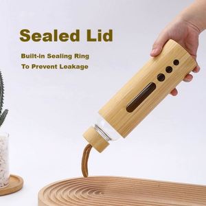 Sustainable 34oz Custom Logo Glass Water Bottles Bamboo Lid Carry Handle for Conference and School Events - Product Image 3