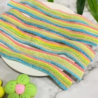Fabricant Vente en gros Bandes fruitées acidulées personnalisées Bonbons Vente à chaud Gommes à la réglisse en poudre acidulée roulée aromatisée aux fruits en vrac