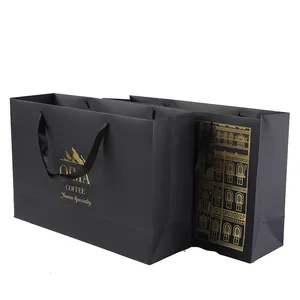 Embossed uv hot stamping gift bag paper recyclable oem luxury paper bag gift packing with ribbon handle