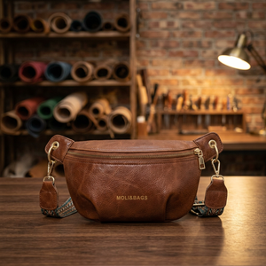 Bolso de Pecho de Cuero Genuino Minimalista de Lujo al por Mayor con Borla, Cierre de Cremallera, Correa Ajustable y Resistente al Agua para Mujer - Product Image 1