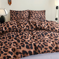 Ensemble de linge de lit 100% polyester à motif léopard, 4 pièces : housse de couette, drap plat et taies d'oreiller pour chambre à coucher